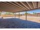 Covered patio area perfect for enjoying the outdoors and entertaining with custom pavers at 6944 E Gary Cir, Mesa, AZ 85207