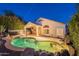 Backyard pool and covered patio with outdoor kitchen, perfect for entertaining at 8158 E Rita Dr, Scottsdale, AZ 85255