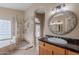 Main bathroom featuring dual shower heads, soaking tub, and granite countertops at 8158 E Rita Dr, Scottsdale, AZ 85255