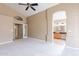 Spacious main bedroom features neutral carpet, vaulted ceilings, and entry to bathroom at 8158 E Rita Dr, Scottsdale, AZ 85255