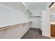 Walk-in closet with built-in shelving for optimal storage space at 8766 W Hayward Ave, Glendale, AZ 85305