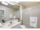 Bathroom featuring a vanity and tiled shower at 10137 W Forrester Dr, Sun City, AZ 85351