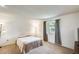 Cozy bedroom with a large window providing natural light at 10137 W Forrester Dr, Sun City, AZ 85351