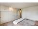 Cozy bedroom featuring built-in storage and closet space at 10137 W Forrester Dr, Sun City, AZ 85351