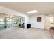 Open layout living room provides a spacious feel and connects seamlessly to the sunroom at 10137 W Forrester Dr, Sun City, AZ 85351