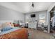 Bright bedroom with a large window, multiple desk areas, and closet for ample storage at 10759 N 101St St, Scottsdale, AZ 85260
