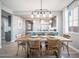 The open floor plan integrates the dining area with adjacent spaces, creating a welcoming atmosphere at 12239 W Caraveo Pl, Peoria, AZ 85383