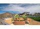 The community playground features unique play equipment and is located near the clubhouse and pool at 12239 W Caraveo Pl, Peoria, AZ 85383