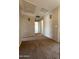 View of the hallway with multiple doorways leading to various rooms at 12547 W Pasadena Ave, Litchfield Park, AZ 85340