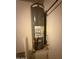 Rheem water heater in a utility area at 12547 W Pasadena Ave, Litchfield Park, AZ 85340