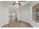 Bedroom showcasing wood floors and lots of natural light at 14672 W Whitton Ave, Goodyear, AZ 85395