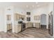 Well-equipped kitchen with stainless steel appliances and ample counter space for meal preparation at 14672 W Whitton Ave, Goodyear, AZ 85395