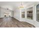 Bright living room with natural light, wood floors and backyard access at 14672 W Whitton Ave, Goodyear, AZ 85395
