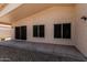 Covered patio featuring a view into the gravel backyard at 14672 W Whitton Ave, Goodyear, AZ 85395