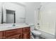 Clean bathroom showcasing a single vanity, tub-shower combo, and neutral tones, providing a functional space at 15515 N 165Th Ave, Surprise, AZ 85388