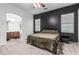Comfortable bedroom with neutral walls, carpet, and an en-suite bathroom for added privacy and convenience at 15515 N 165Th Ave, Surprise, AZ 85388