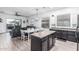 Open-concept living and dining area with abundant natural light, modern fixtures, and comfortable seating at 15515 N 165Th Ave, Surprise, AZ 85388