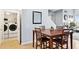 Dining area adjacent to laundry and with views through to the living room at 1701 E Colter St # 443, Phoenix, AZ 85016