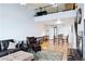 Bright, open-concept living area with a view of the upper level and comfortable seating at 1701 E Colter St # 443, Phoenix, AZ 85016