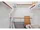 A walk-in closet features built-in shelving and plenty of room for storage at 1701 E Colter St # 443, Phoenix, AZ 85016