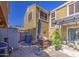 Backyard patio features comfortable seating, desert landscaping, shade cover, and stone flooring at 1786 S Seton Ave, Gilbert, AZ 85295
