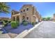 Exterior view of a two-story home featuring low maintenance rock landscaping and clean sidewalk at 1786 S Seton Ave, Gilbert, AZ 85295