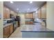 Well-equipped kitchen with modern appliances, ample counter space, and classic wood cabinets at 1786 S Seton Ave, Gilbert, AZ 85295