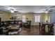 Spacious living room with hardwood floors, comfortable seating, and natural light at 1786 S Seton Ave, Gilbert, AZ 85295