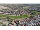 Residential area aerial showcasing the community layout with golf course, homes, and scenic surroundings at 22508 W Antelope Trl, Buckeye, AZ 85326