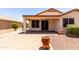 A covered patio offers a shady outdoor retreat in the backyard at 22508 W Antelope Trl, Buckeye, AZ 85326