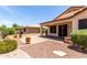 Paver patio in a landscaped backyard with grass at 22508 W Antelope Trl, Buckeye, AZ 85326