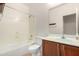 This bathroom has a vanity, toilet, and shower over tub at 22508 W Antelope Trl, Buckeye, AZ 85326