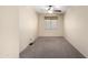 Clean, neutral bedroom with carpet and a ceiling fan at 22508 W Antelope Trl, Buckeye, AZ 85326