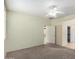 Bedroom showcasing neutral carpet, ceiling fan, and closet at 22508 W Antelope Trl, Buckeye, AZ 85326