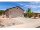 Beautiful single-story home with desert landscaping, a driveway, and a two-car garage at 22508 W Antelope Trl, Buckeye, AZ 85326
