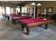 Relaxing game room featuring several billiard tables for friendly competition and entertainment at 22508 W Antelope Trl, Buckeye, AZ 85326