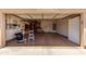 The garage has epoxy floors and a storage cabinet at 22508 W Antelope Trl, Buckeye, AZ 85326