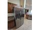 The kitchen shines with its stainless steel refrigerator, offering convenience and style at 22508 W Antelope Trl, Buckeye, AZ 85326