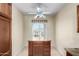 Kitchen island featuring granite counters and wood cabinets at 22508 W Antelope Trl, Buckeye, AZ 85326