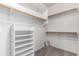 Walk-in closet featuring adjustable shelving and clothing rods at 22508 W Antelope Trl, Buckeye, AZ 85326