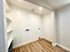 Well-lit laundry room space with new floors and convenient hookups at 2258 E Alpine Ave, Mesa, AZ 85204