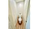 This powder room features clean lines, wood plank flooring, and a modern toilet at 2258 E Alpine Ave, Mesa, AZ 85204