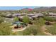 Neighborhood aerial view featuring a blue playground for children with benches and mature landscaping at 2321 W Brookhart Way, Phoenix, AZ 85085