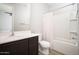 Well-maintained bathroom featuring a shower-tub combo, modern vanity, and great lighting at 2321 W Brookhart Way, Phoenix, AZ 85085