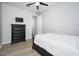 Bedroom with light gray walls, ceiling fan and closet for optimal storage at 2321 W Brookhart Way, Phoenix, AZ 85085
