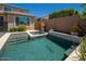 Inviting pool and spa area with ample space, set in a private backyard, with lush landscaping at 2321 W Brookhart Way, Phoenix, AZ 85085