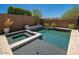 Beautiful pool and spa, surrounded by desert landscaping and hardscape offers a private retreat at 2321 W Brookhart Way, Phoenix, AZ 85085