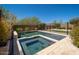 Beautiful backyard pool and spa with travertine pavers and desert landscaping with secure wrought iron fencing at 2321 W Brookhart Way, Phoenix, AZ 85085