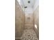 Tiled shower with a built-in bench, rainfall shower head, and handheld sprayer at 2321 W Brookhart Way, Phoenix, AZ 85085