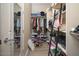 Walk-in closet with shelves, rods, and storage space for shoes and accessories at 2321 W Brookhart Way, Phoenix, AZ 85085